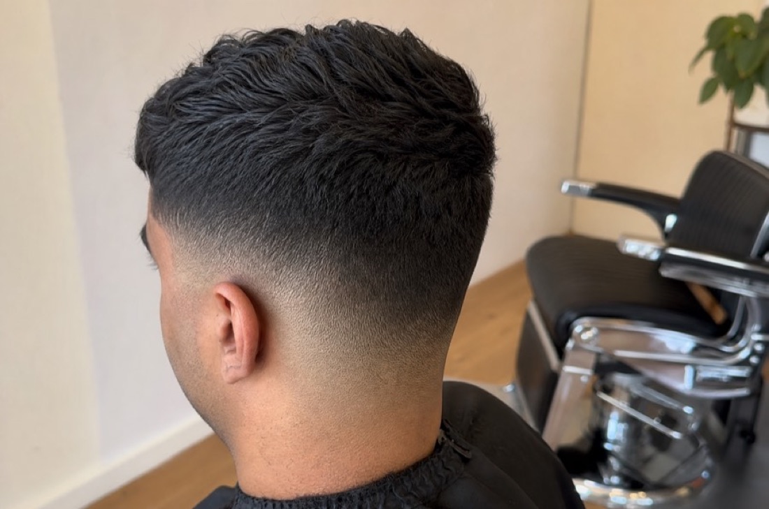 Close detail of a fresh barber fade